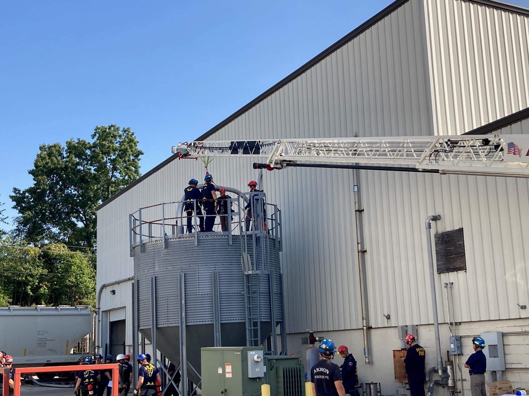 Local firefighters conduct confined spaces rescue training at ASW Global on the border of Akron and Mogadore